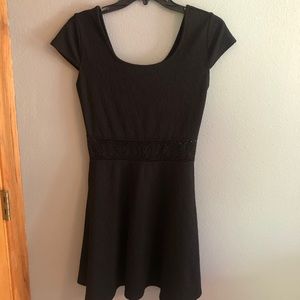 Black dress with lace cut out belt